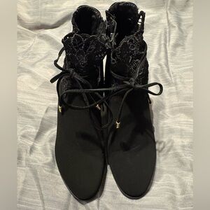 Venus black booties with lace and tie trim. Super cute.